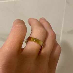 Gold love ring